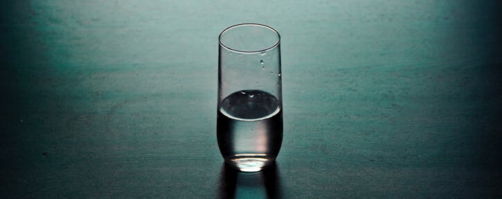 Half empty glass of water